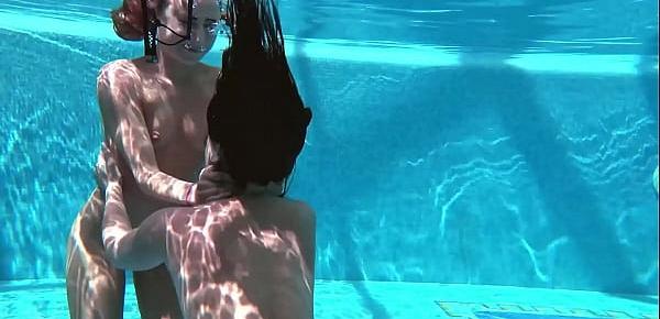  Jessica and Lindsay swim naked in the pool